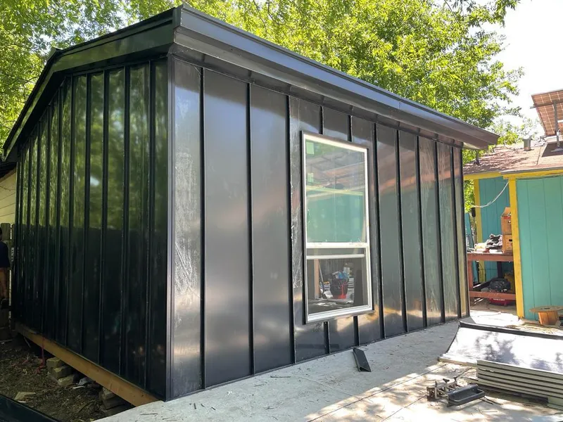 Black standing seam metal wall panels for Roof Inspection in Tuscumbia