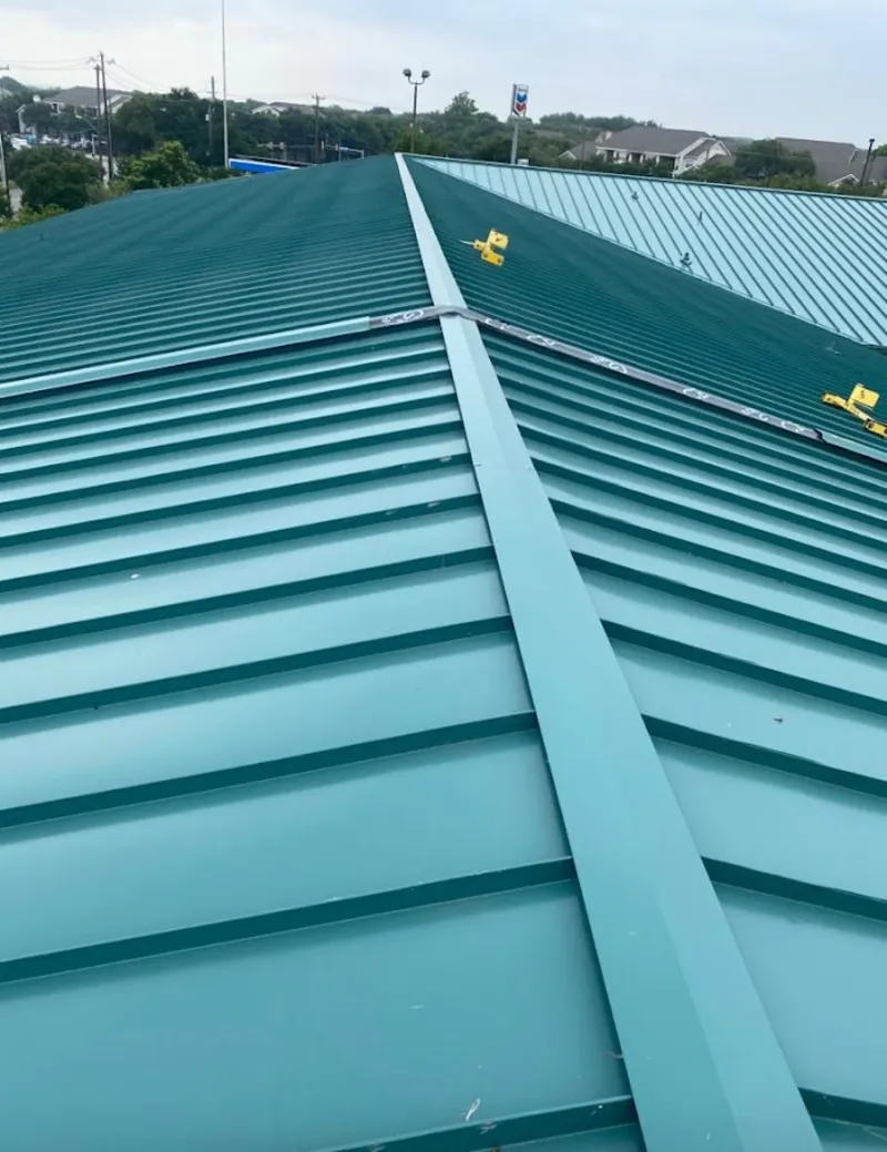 Green commercial metal roof ridge and valley for Metal Roof Repair in Tuscumbia